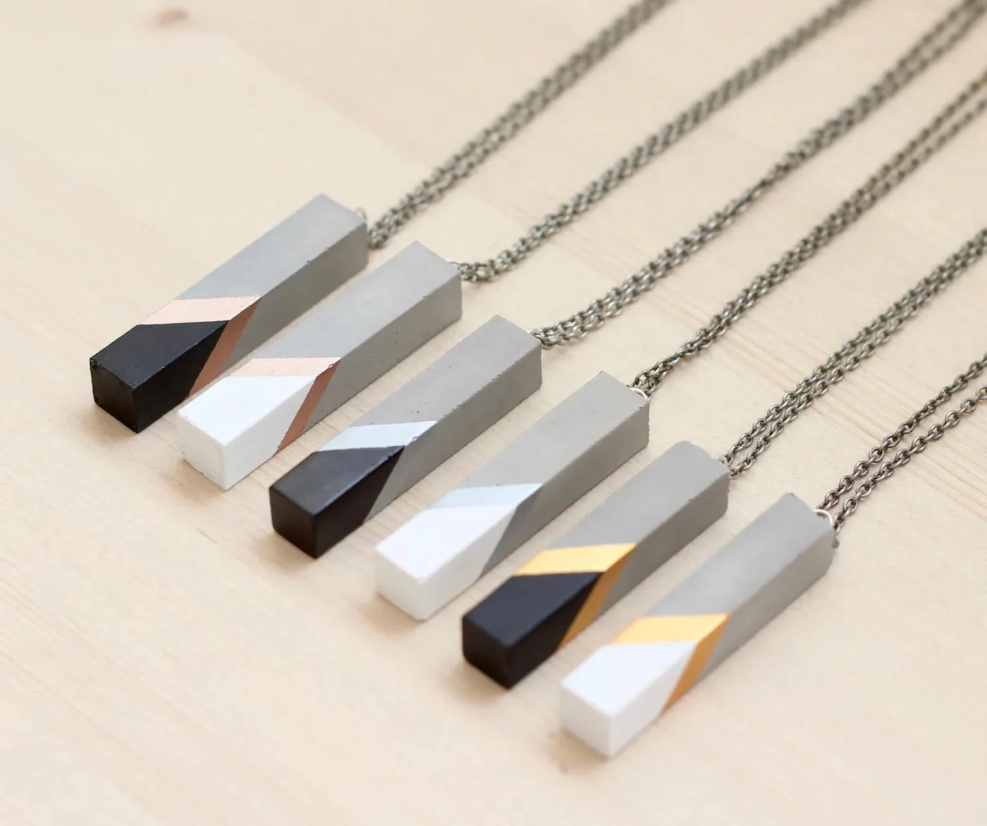 Minimal necklace with a concrete bar pendant