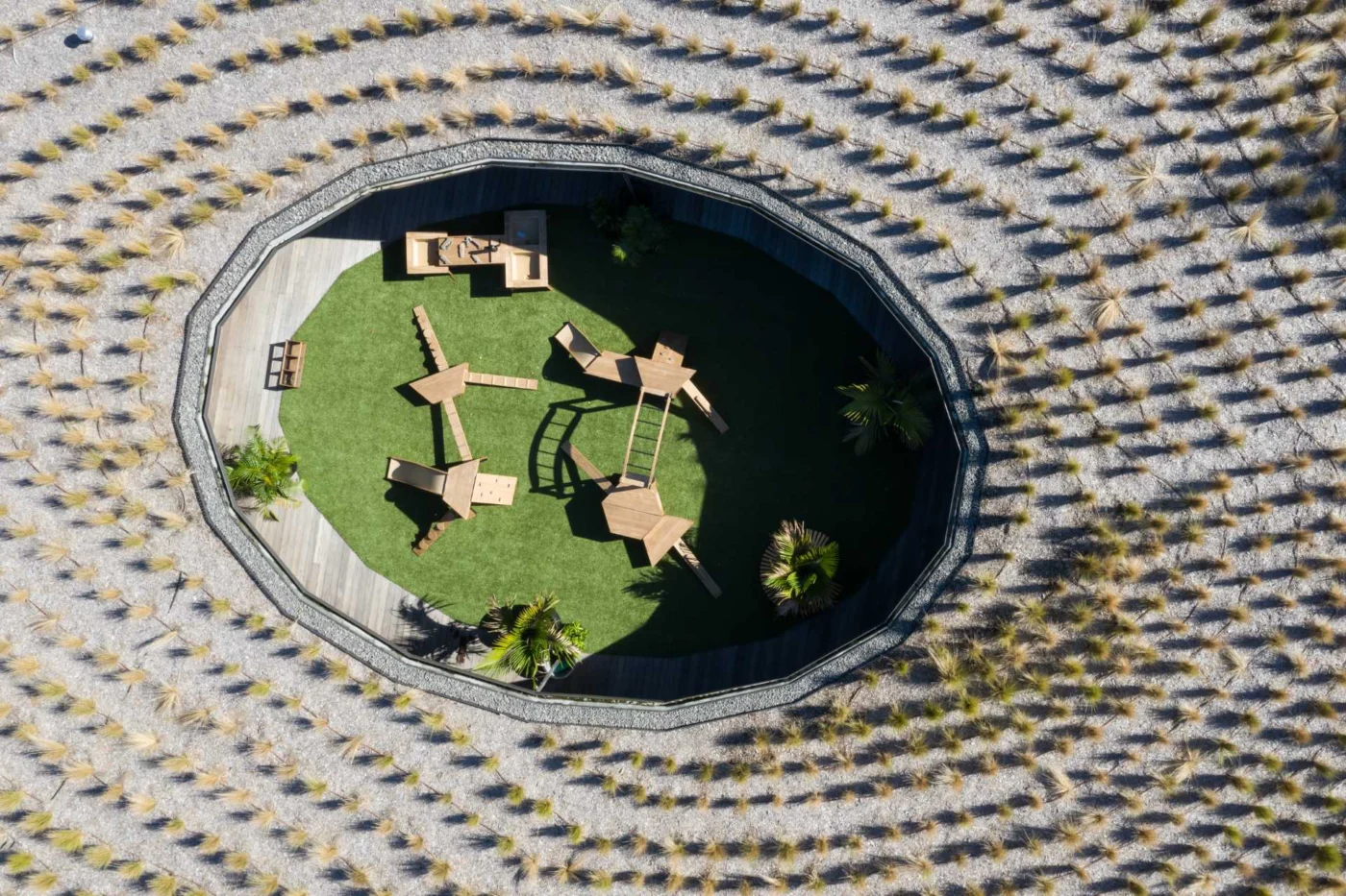 Curved edge of the green roof blending the building into its setting