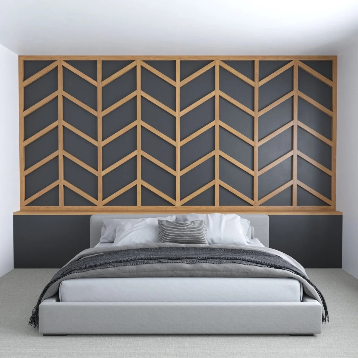 Chevron pattern wood accent wall with a matching frame in a bedroom