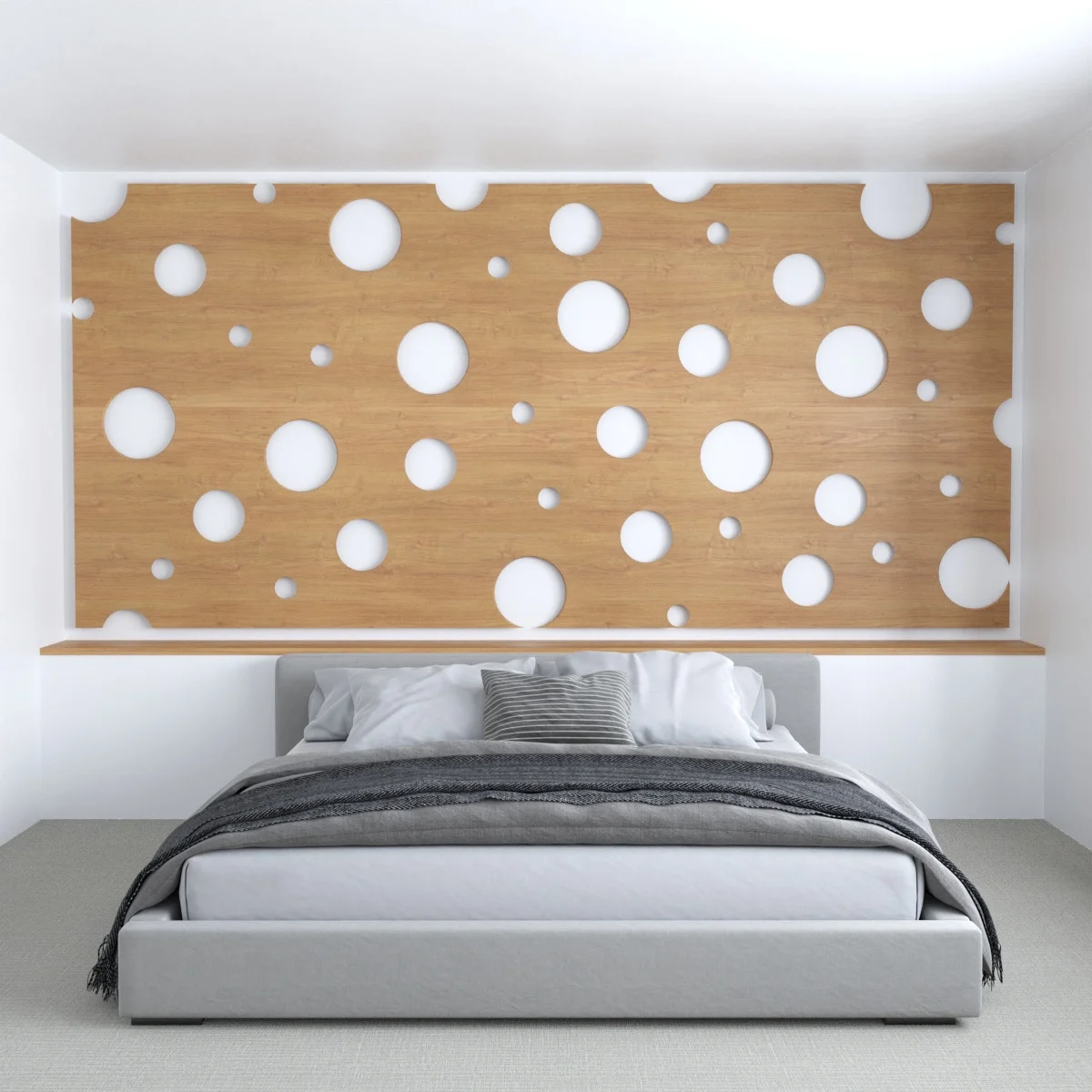 Wood accent wall with circular cut-outs above a bed