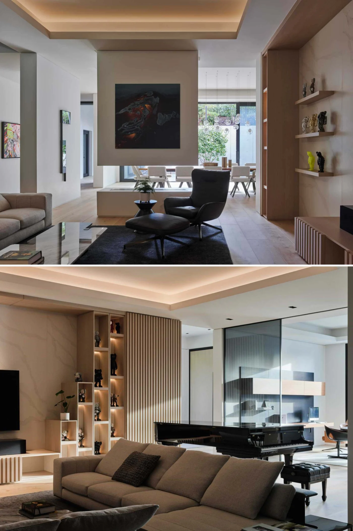 Living room with display shelves and a fireplace at one end