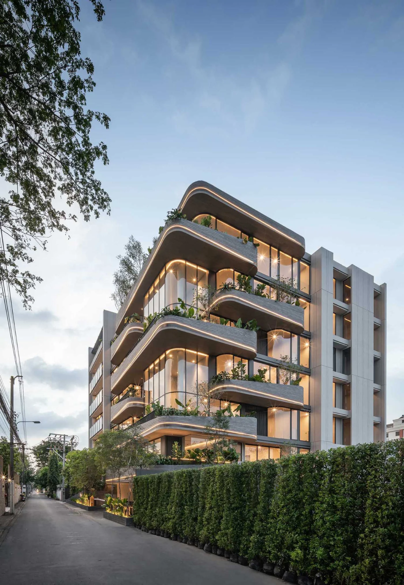 Lighting lines following the rounded corners of the condo building