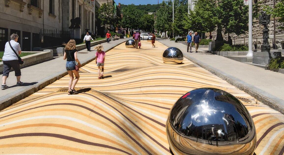 a-large-scale-public-art-mural-that-appears-to-warp-the-street