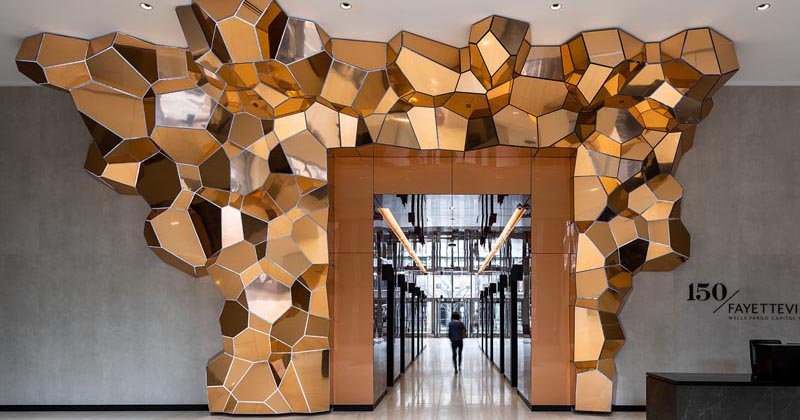 a-crystalline-inspired-sculpture-creates-a-focal-point-in-this-office-lobby