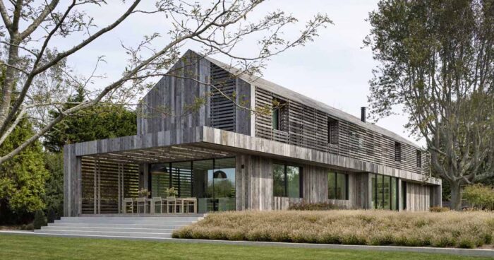 reclaimed-weathered-wood-siding-covers-this-home-inspired-by-farm-buildings