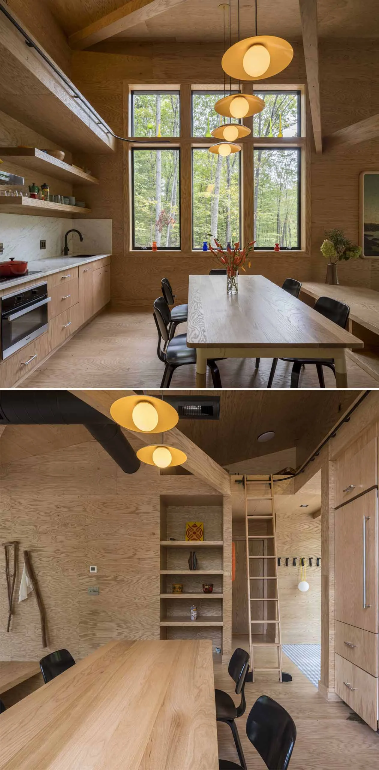 Dining area with a wood table and black chairs below the kitchen shelves