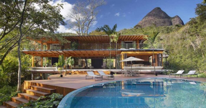 the-post-and-beam-structure-is-on-display-around-this-home