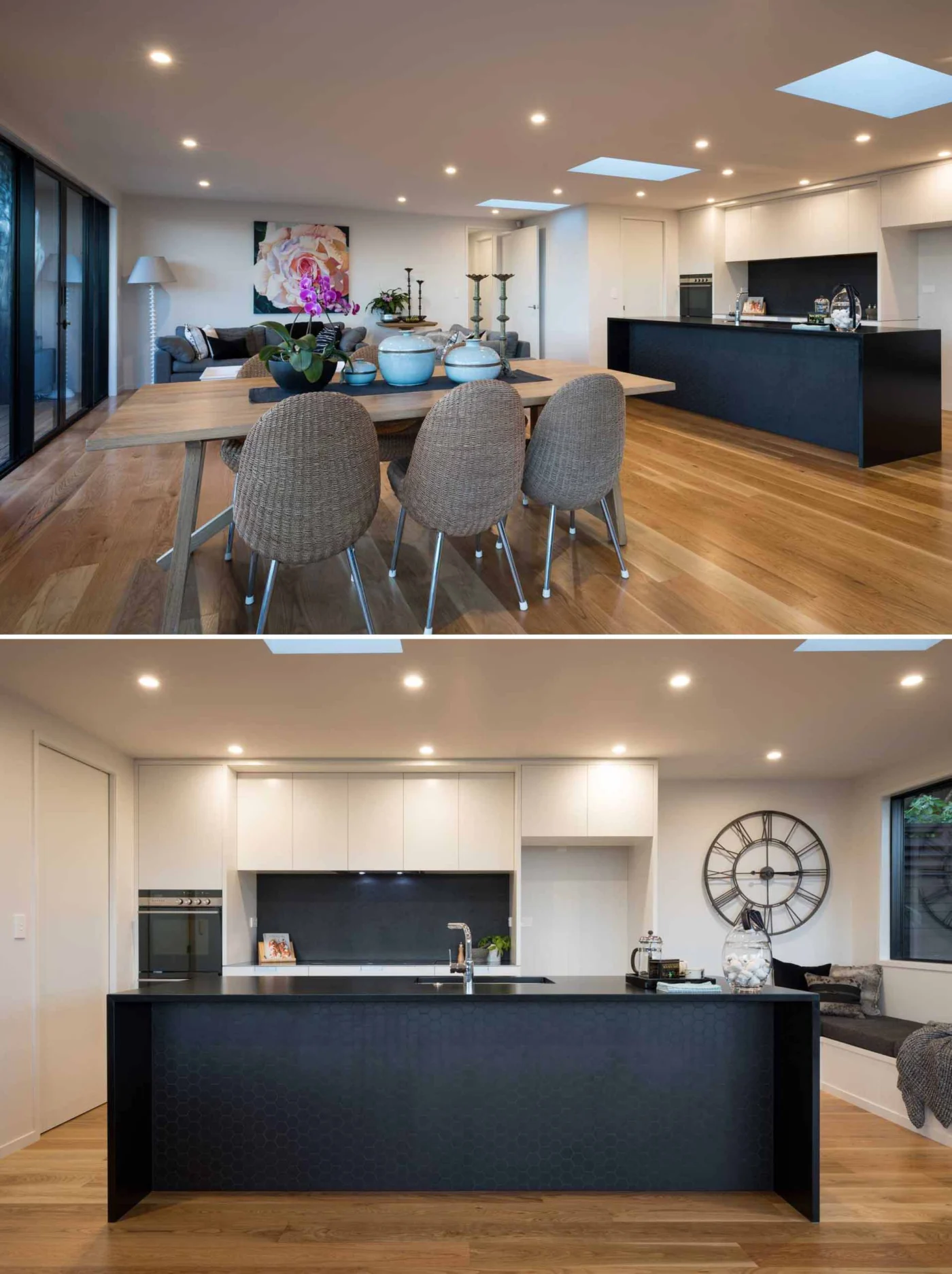 Open-plan living, dining and kitchen area lit by skylights