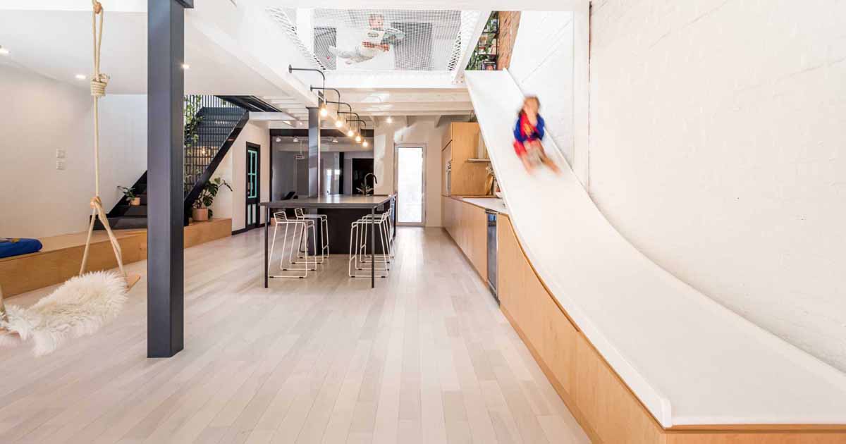 a-slide-is-a-fun-alternative-to-the-stairs-inside-this-home