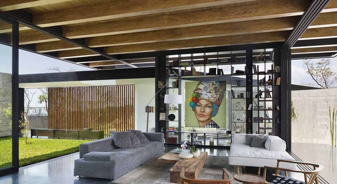 the-exposed-wood-ceiling-of-this-home-shows-off-its-structure