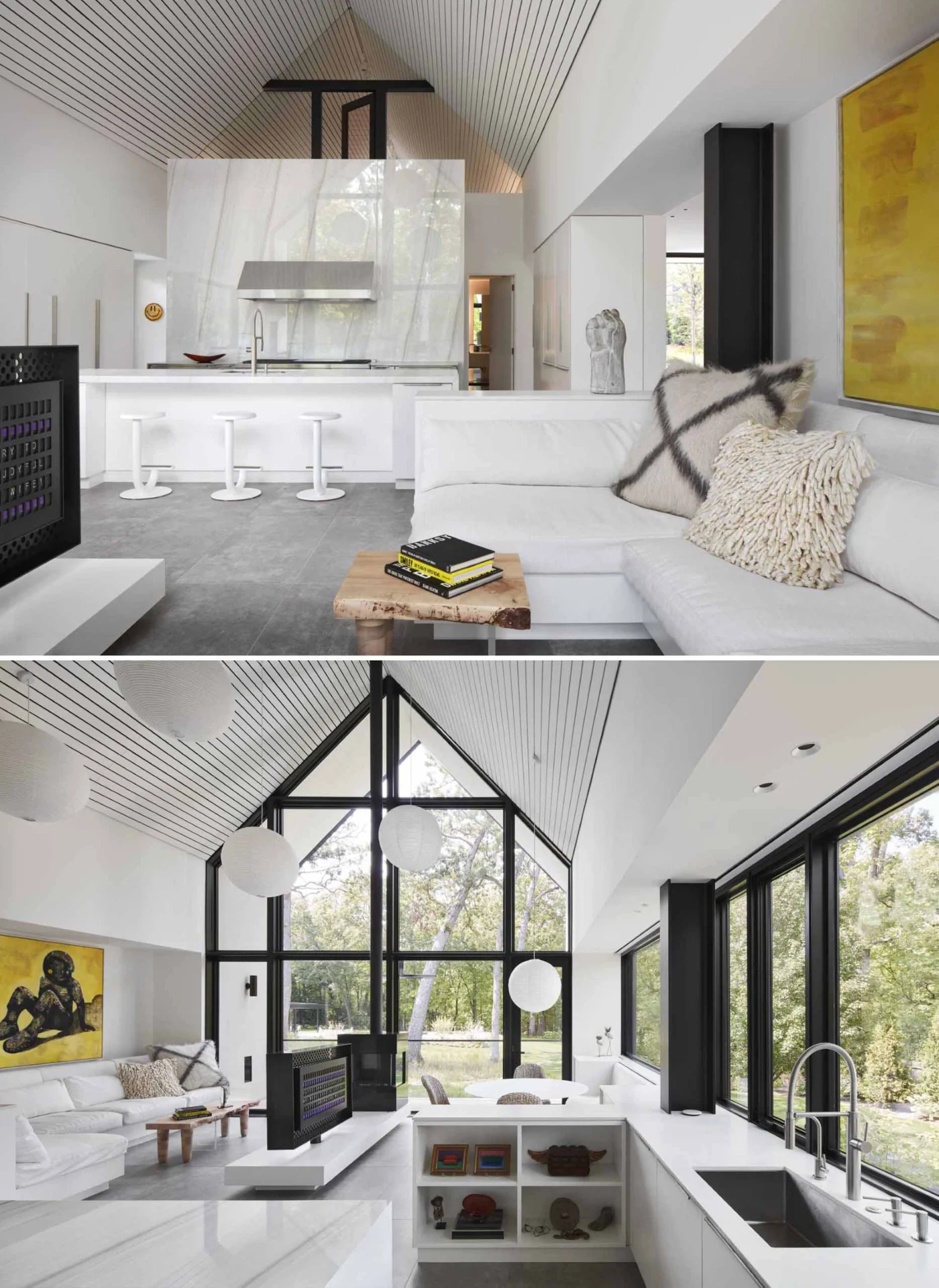 White kitchen with an island opening to a casual living area
