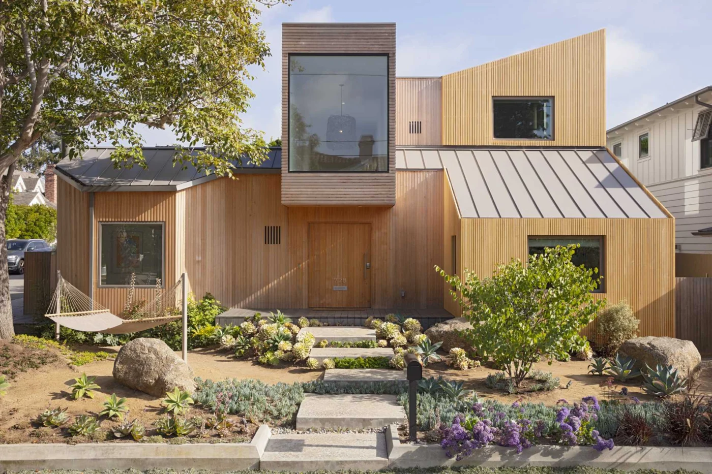 This Renovated 90s Home Includes a New Exterior Made of Alaskan Yellow Cedar Siding