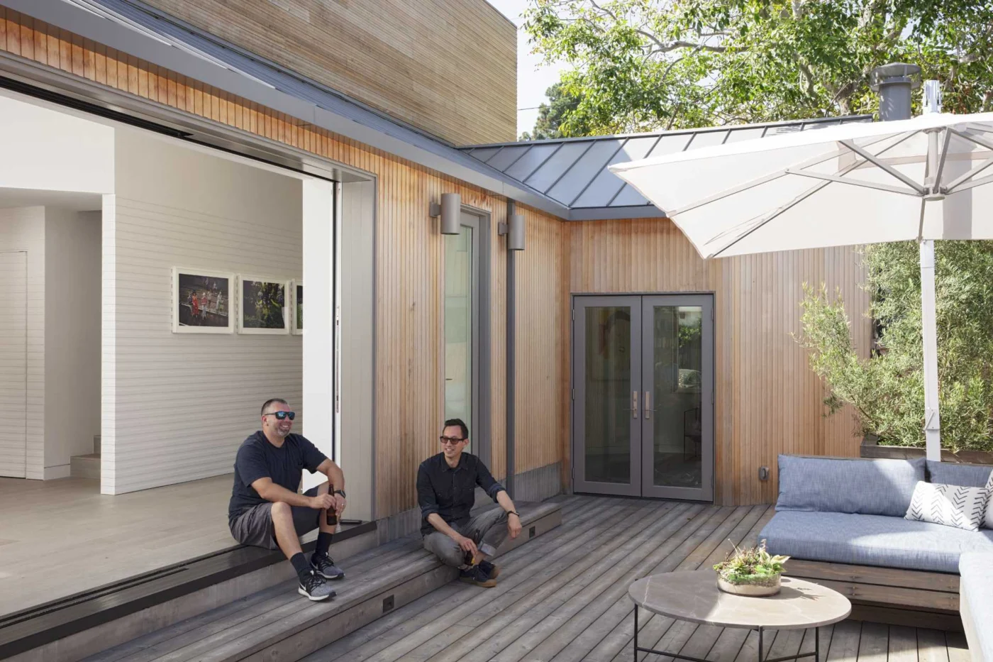 Patio beside the living room with an outdoor lounge
