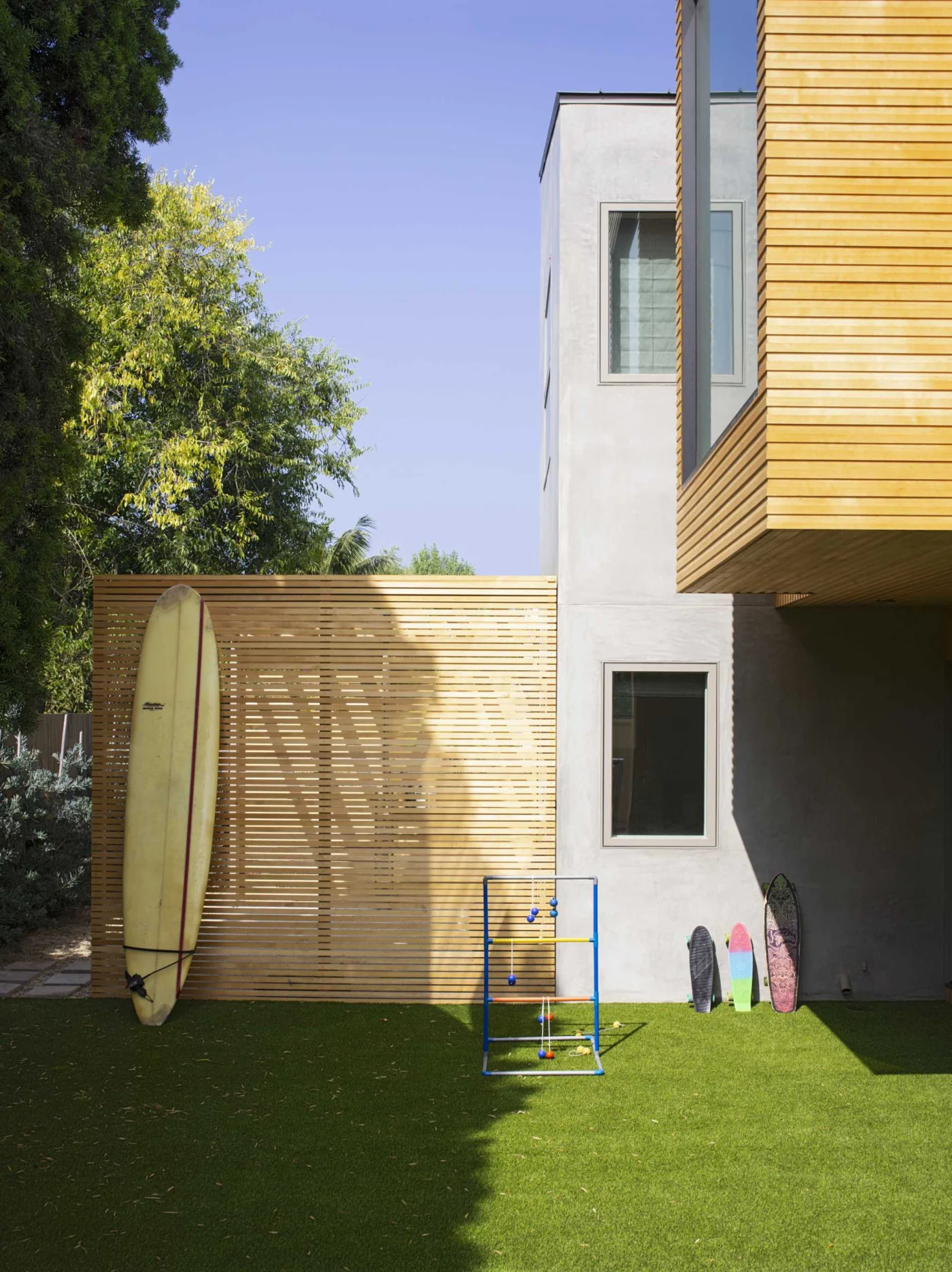 Outdoor shower screened with wood slats