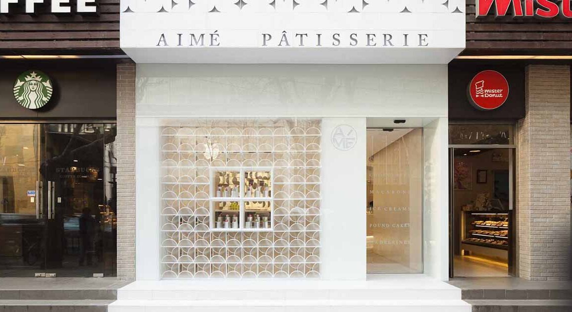 the-design-of-this-modern-white-patisserie-stands-out-from-its-neighbors