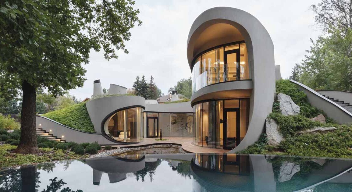 this-sculptural-home-is-full-of-curves-and-surrounded-by-landscaping