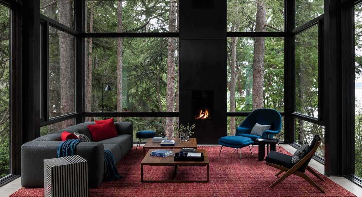 a-living-room-that-floats-above-the-forest-floor-is-a-remarkable-feature-of-this-home