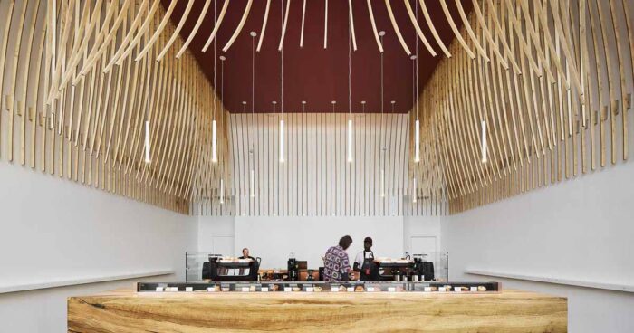 272-wood-slats-were-used-to-create-a-sculptural-element-inside-this-new-coffee-bar