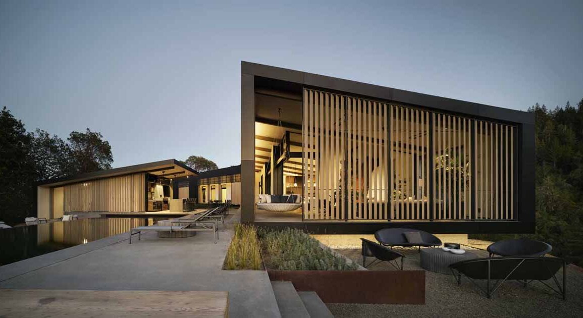 the-post-and-beam-structure-is-on-display-inside-this-new-home
