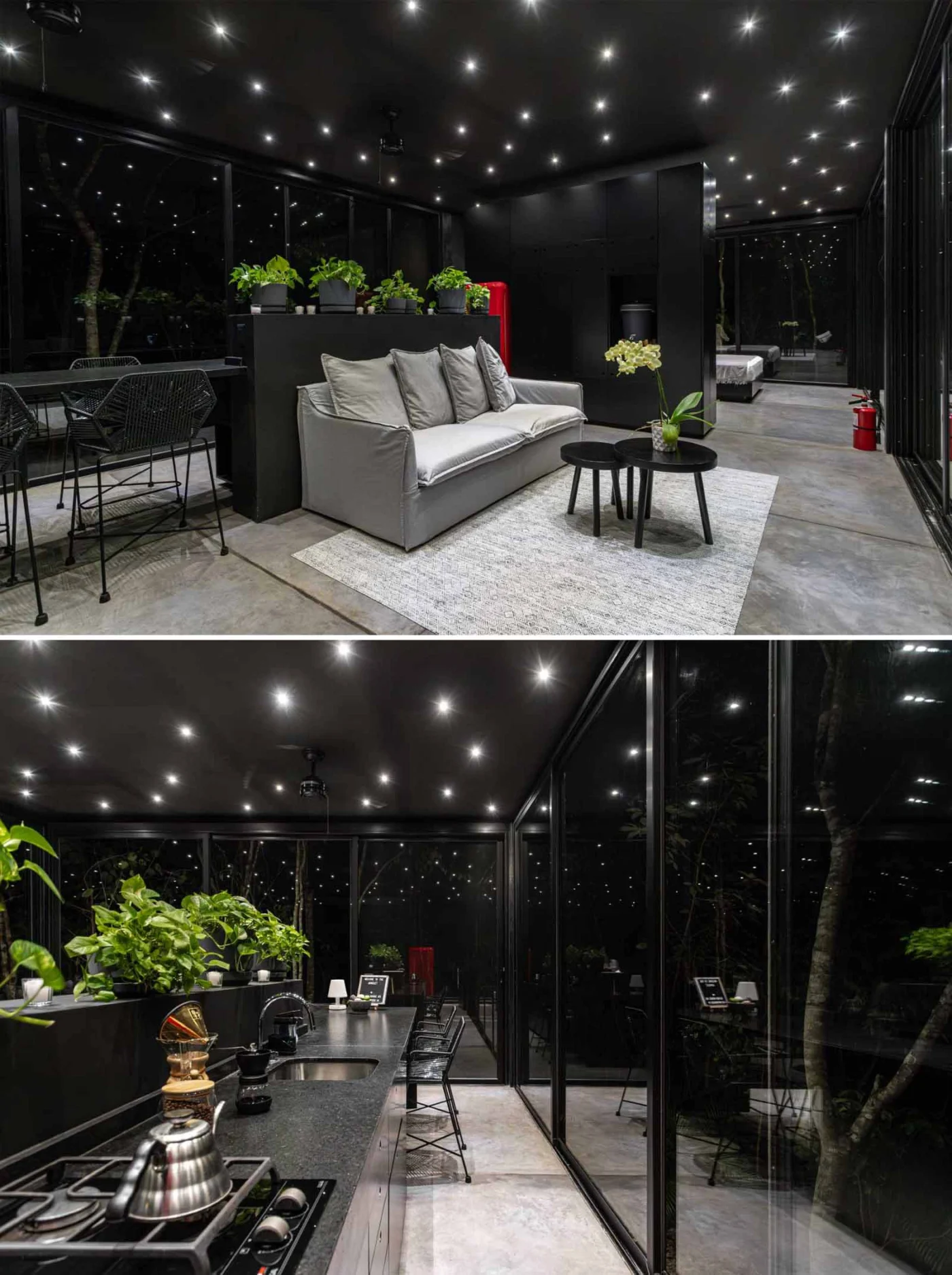 Interior of an off-grid glass house open to the jungle for cross ventilation