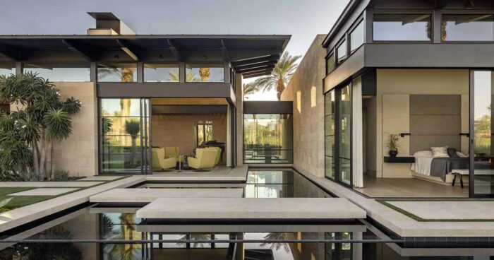 reflecting-ponds-and-concrete-lily-pads-help-create-tranquility-at-this-modern-home
