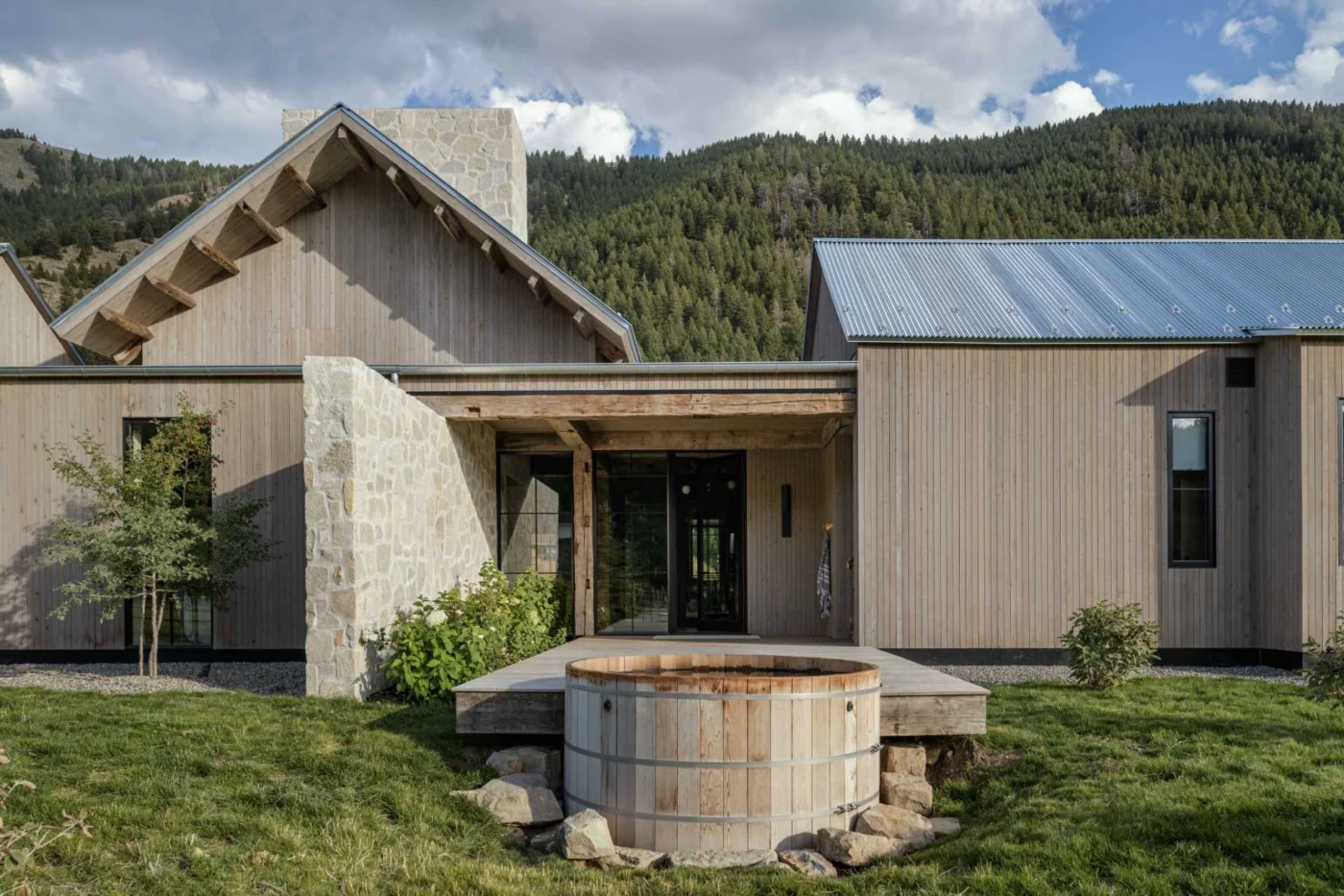 Outdoor hot tub beside the ranch home