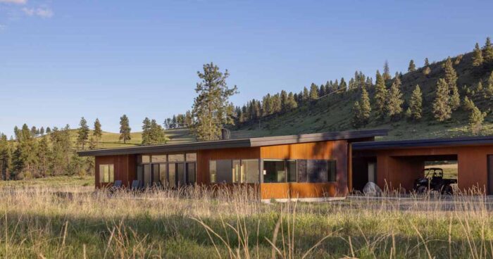 a-weathered-corrugated-metal-exterior-protects-this-home-on-a-ranch
