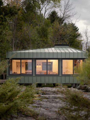 small cabin green metal siding 071124 1052 011