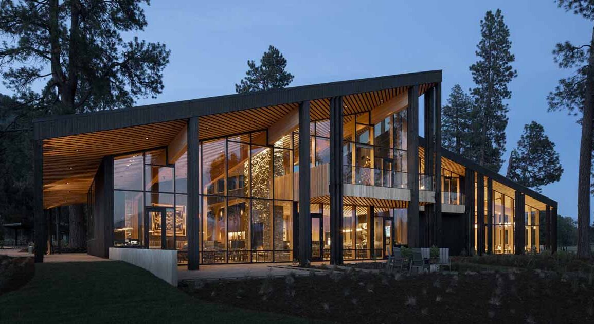 a-warm-wood-interior-contrasts-with-the-black-charred-cedar-exterior-at-this-ranch-lodge-in-oregon