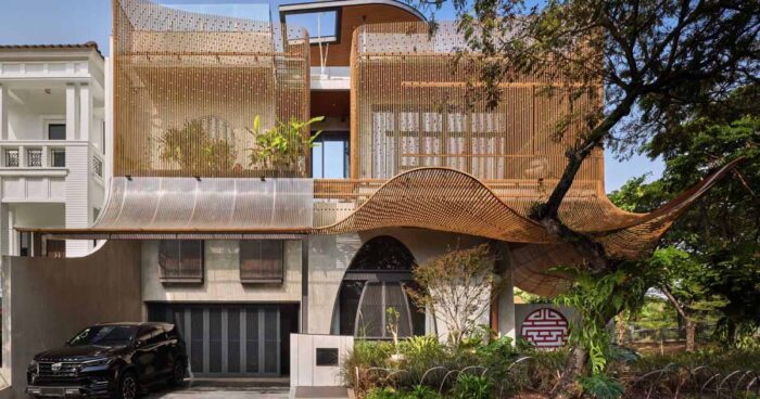 steel-fins-create-a-sculptural-facade-for-this-home