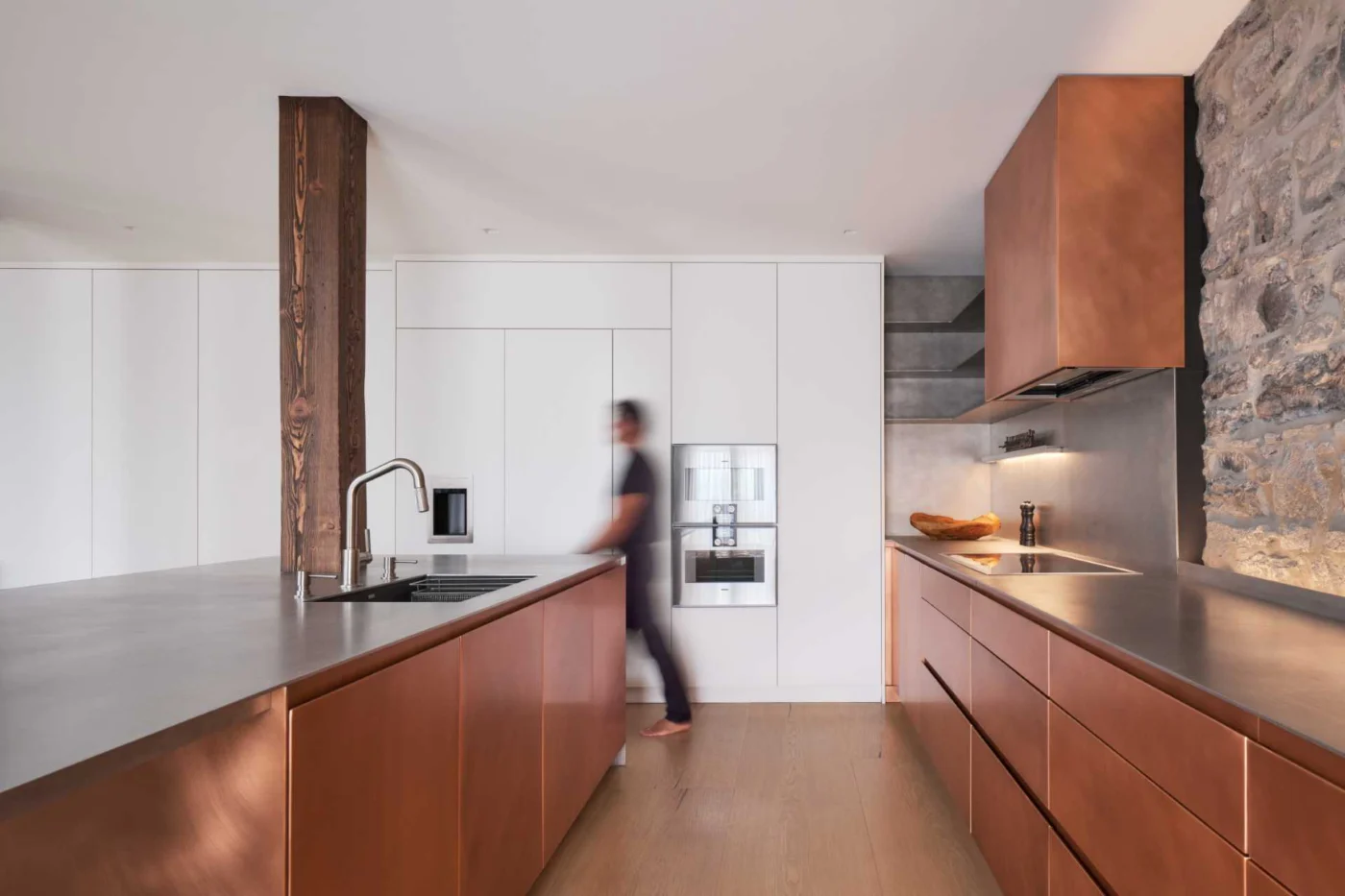 Copper Kitchen Cabinets Add to the Refined Rustic Feeling Inside This Renovated Historic Loft
