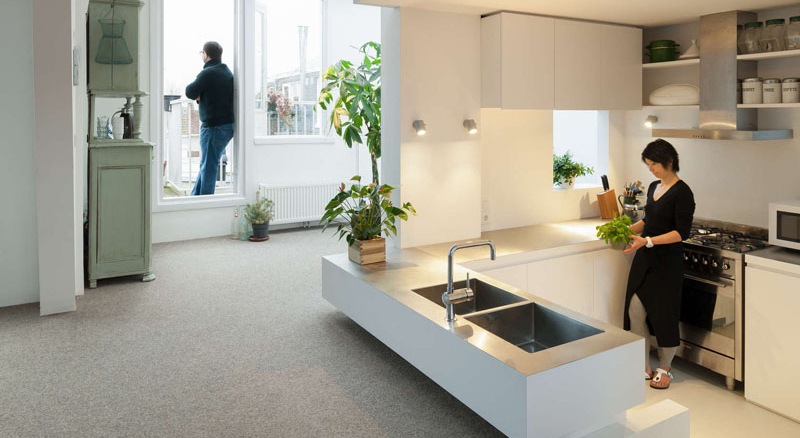 a-sunken-kitchen-and-lofted-play-area-reinvented-this-apartment