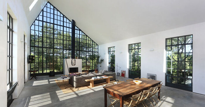 inside-a-guest-house-with-double-height-living