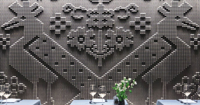 the-story-behind-olivo’s-striking-stone-tapestry-walls