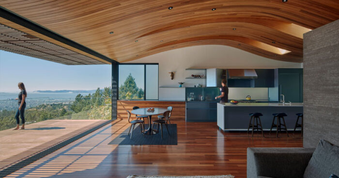 a-mountain-top-home-where-the-roof-billows-like-fog