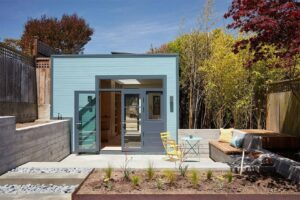 how-a-small-carriage-house-became-a-serene-creative-space-with-a-reading-nook