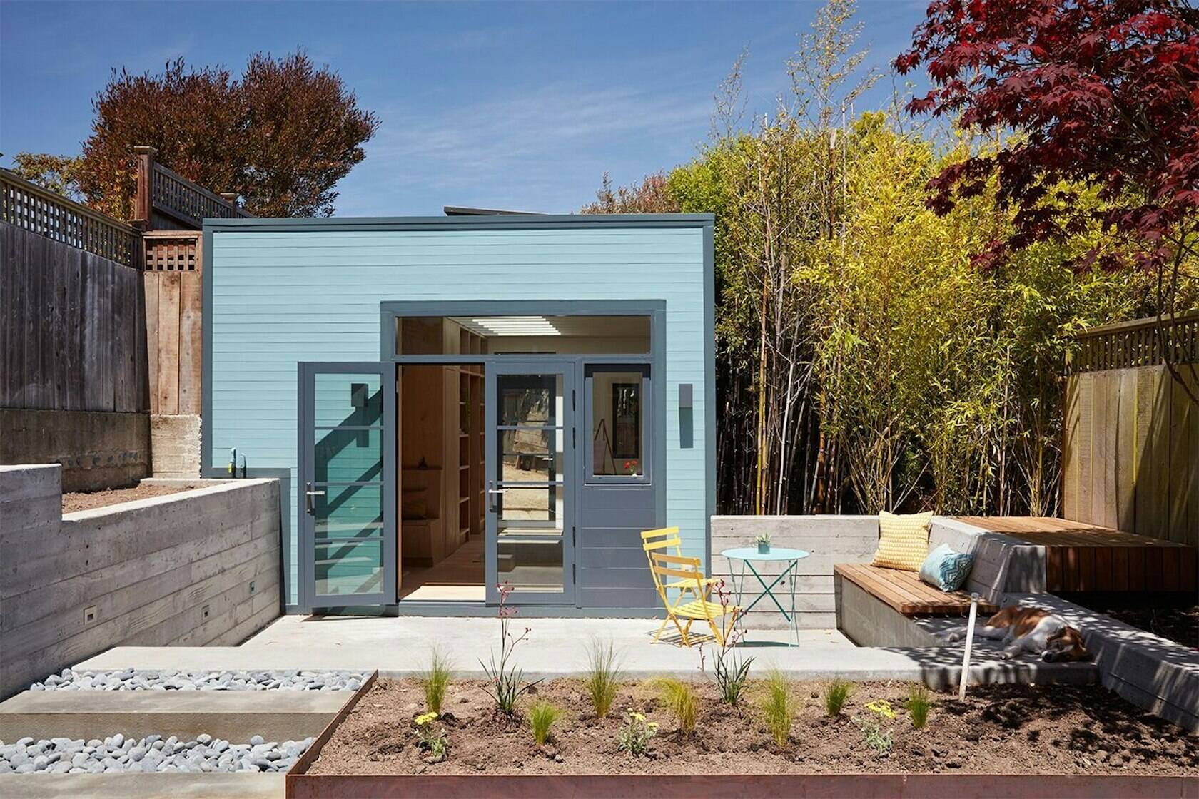 how-a-small-carriage-house-became-a-serene-creative-space-with-a-reading-nook