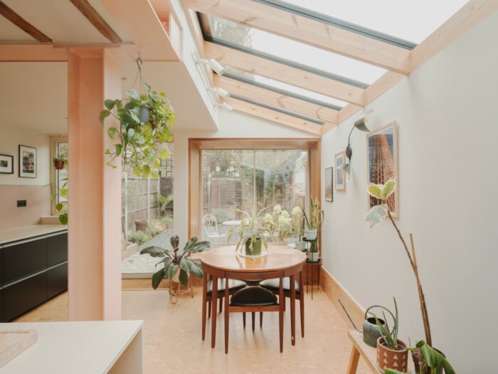 pink-steel-and-cork-flooring-bring-warmth-and-personality-to-a-new-garden-extension
