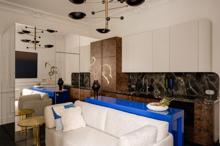 this-small-apartment-feels-twice-the-size,-because-the-bathroom-hides-in-a-mirrored-box