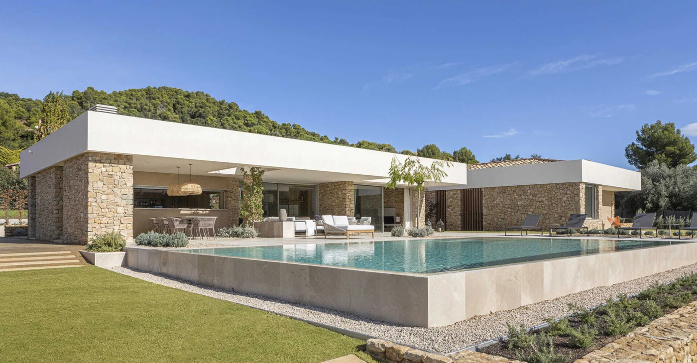 A Mediterranean Stone House Made for Poolside Living